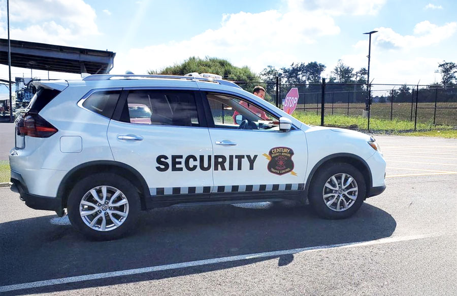 Century Security white SUV
